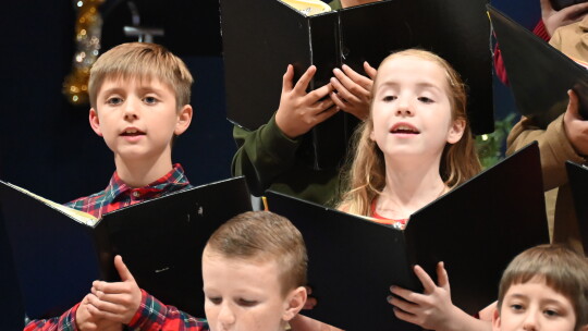 Ryan Lawrence and Emelia Collett, St. Mary’s fourth-graders sing “Do You Hear What I Hear.”