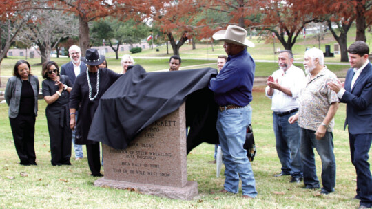 District 1 Councilman Gerald Anderson and his mother Dannie Royal unveil the cenotaph dedicated to their late relative Bill Pickett at the Texas State Cemetery.