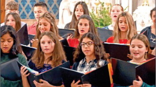 St. Mary’s choir students sing a selection of traditional Christmas songs at their Christmas concert.