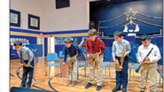 St. Mary’s sixth grade boys take a bow after their perfomance. Courtesy photos