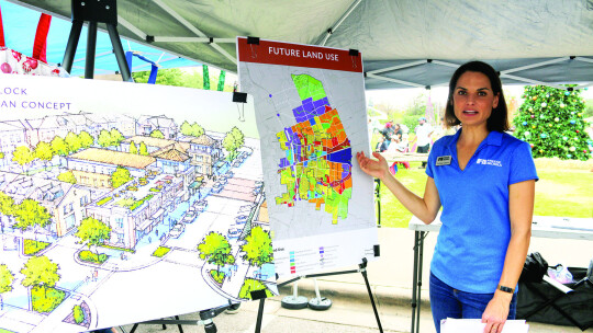 Caitlin Admire was part of the Freese &amp; Nichols team on hand to explain the plan to anyone with questions. There were also comment cards residents could fill out. Photo by Edie Zuvanich