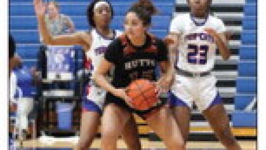 Lady Hippos junior Charlize Williams shielding off defenders after collecting a rebound. Courtesy Photo Temple ISD