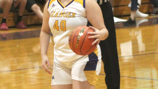 Lady Lions guard Destiny Cotten dribbling the ball up the court on a fast break. 