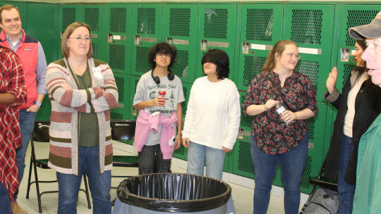 Coach Larry Safarik tells Taylor ISD Ambassadors about the outdoor recreation program at Taylor Middle School.