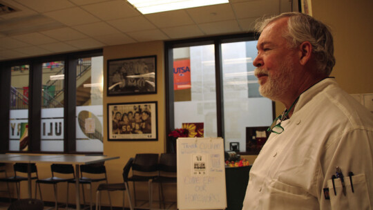 Instructor Mark Erickson shows visitors the Top Flight restaurant area at Taylor High School, where members of the public can sample student creations. Photo by Nicole Lessin