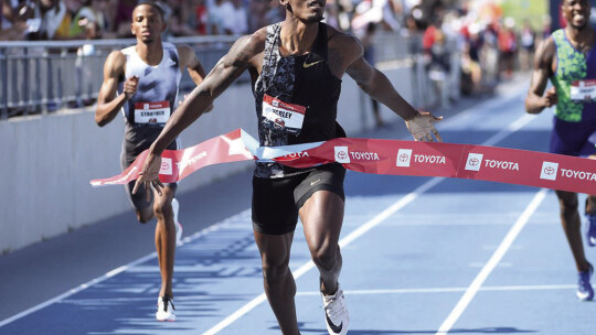 Fred Kerley begins to celebrate as he crosses the finish line of his race. File Photos