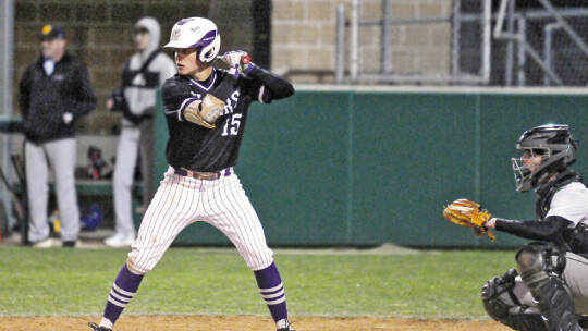 Maverick McAllister settling into his stance waiting for the pitch. Photo by Larry Pelchat