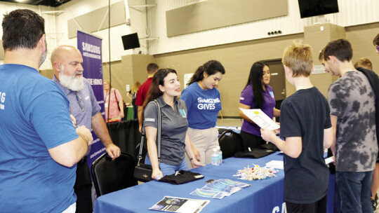 Joseph Verdin, Brian Sasser, Summer Abdullah, Divya Singh and Jessica Chavez encourage students to go online and find out more about technician and engineering opportunities at Samsung Austin Semiconductor.