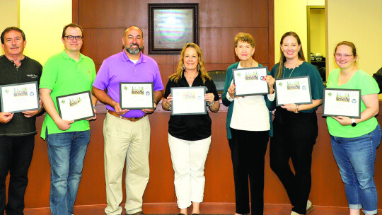 Taylor ISD Ambassadors receive certificates for completing the 2022-23 program. From left are Superintendent Devin Padavil, Tim Mikeska, Brady Collier, Robert Garcia, Billie Logiudice, Jo Lindquist, Cynthia Dennen, Desiree Grady and Ambassador coordinator, Tim Crow. Not pictured are Alayne...