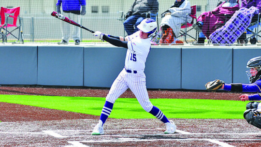 Maverick McAllister swinging and fouling a ball off during game against Granger. Photo by Larry Pelchat