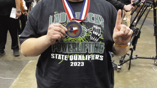 Lady Ducks senior Analise Frias shows off her medal after winning the state championship. Courtesy Photo