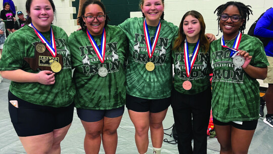 The Lady Ducks powerlifting team who went to state included (back row, from left) Nicolette Villarreal, Karina Hall-Albavera, Krista Randig, Analise Frias, Ri’Queleigh Holmes-Grant, Sophia Plonka, Rylie Dlouhy and Eliana Aleman. (Front row from left) Vanessa Diaz and Zoe Moore. Courtesy Ph...