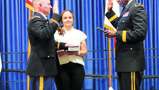 Newly promoted Lt. Col. Joseph Meller reaffirms his oath of office during a Feb. 8 ceremony at Camp Mabry. The soldier is a Taylor resident. Photo by Daniel Philhower