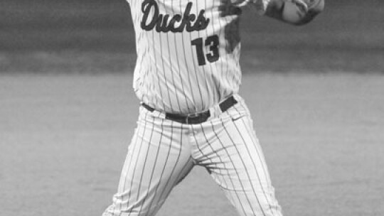 Ducks junior third baseman Aiden Aguero fields a ground ball before throwing the runner out at first. Photo By Larry Pelchat