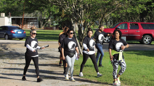 A group of participants walk the 3K chanting “Break the silence,” to raise awareness about childhood sexual abuse.