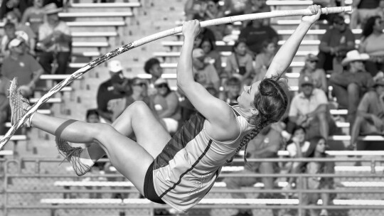 Avery Koonce soars through the air during the pole vault to land in first place. Courtesy Photo