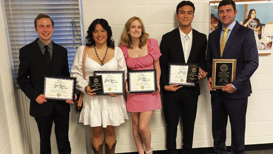 Legacy Early College Rotary scholars include Jesus Cruz, Abigail Garcia, Evan Polasek and Eva White. Photo by Tim Crow