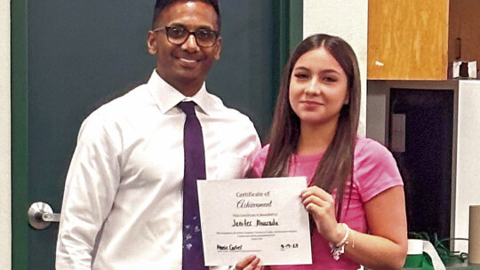 Jennifer Alvarado (right) completed the final semester at TASC, and received her certificate of completion from Devin Padavil, superintendent.