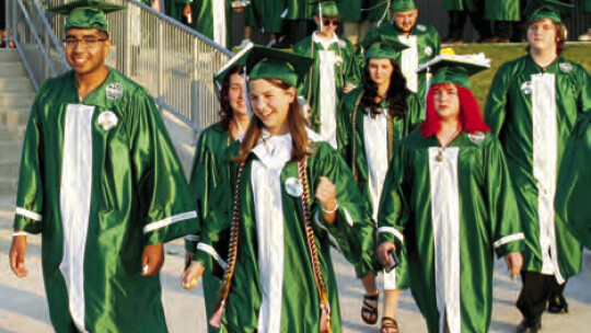 Above: About 200 seniors walked around the Taylor High School football field the evening of May 26 to celebrate the Class of 2023 commencement. The school is at 355 FM 973. Below: On their way to a new beginning, Taylor High School seniors smile in anticipation of a much-anticipated gradua...