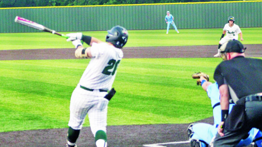 Ducks senior designated hitter Cohen Tyree takes a powerful swing at a pitch on Thursday, May 25 during Taylor’s 4-2 victory in Game 1 of the regional semifinals vs. Spring Hill. Photos by Andrew Salmi