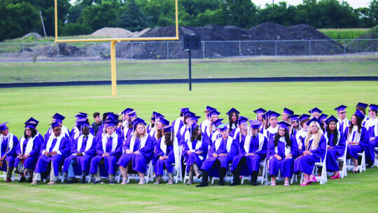 The 2023 Thrall High School graduating class sit patiently waiting for their name to be called during graduation last week.