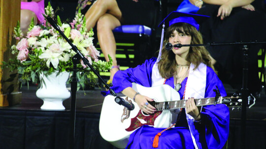 Kennedy Yanez performs her original song “Stay” at he Thrall High School graduation ceremony.