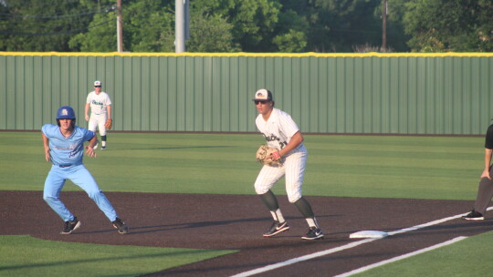 Ducks junior first baseman Braylan Alderete holds a Panther runner on during Taylor’s 4-2 win against Spring Hill.