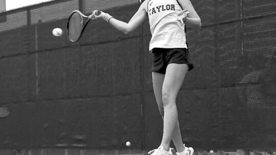 Taylor High School girls varsity tennis freshman Rylee Michna returns the ball on April 26 during the UIL 4A Girls Singles Tournament held in San Antonio. Photo by Krista Randig