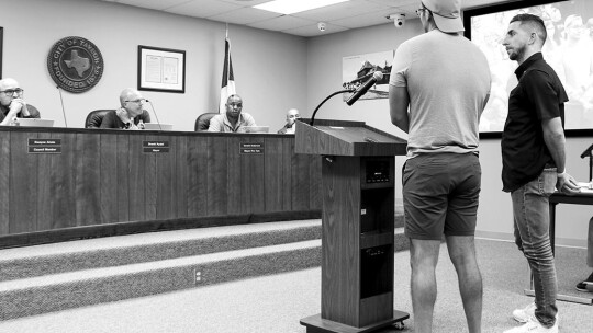 A married couple thanks the Mayor and Council for their support of the LGBTQ community. Photo by Edie Zuvanich