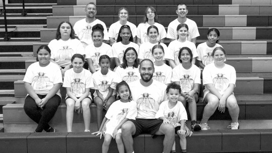 Taylor campers and coaches from grades six through nine happily pose together on Thursday, June 8 prior to the start of the final day of Lady Ducks Youth Basketball Camp. Photos by Andrew Salmi