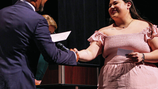 Analise Frias accepts one of three Gary L. Keith Memorial Scholarships in the amount of $500.