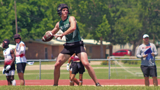 Taylor varsity football senior quarterback Joshua Mikulencak prepares to throw a pass deep downfield vs. Lorena during the 7-on-7 state qualifying tournament held in Cameron.