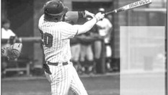 Taylor High School varsity baseball senior third baseman Cohen Tyree rips a base hit on April 4 during the Ducks’ 7-2 win at home vs. La Grange High School. Photo by Ryan Newsom