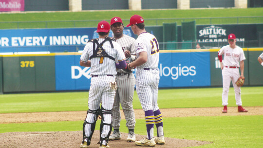 Granger varsity baseball senior catcher Nathan Tucker talks with South first baseman teammate Jaquae Stewart of Sinton (center) and pitcher Ryan Peterson (right) of Shiner on June 17 during the THSBCA All-Star Game held at Dell Diamond in Round Rock.