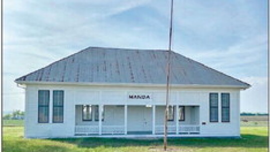 Historic Manda School that has been restored by the New Sweden community. The school is one of the sites that the Save New Sweden organization is trying to protect from the proposed concrete batch plant. Photo by Susan Erickson