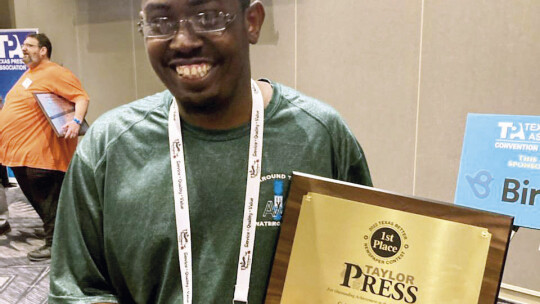 Taylor Press Area Editor displays his First Place recognition for Column Writing for the 2022 Better Newspaper Contest June 5 at Kalahari Resorts. Photo by Nicole Lessin