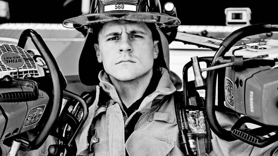 Firefighter John Cufr, who climbed up onto the balcony and rescued the two residents by escorting them back down the ladder to safety. Courtesy photo