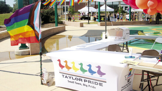 Taylor Pride Music and Arts Festival had a welcome booth towards the entrance of Heritage Park where guests checked in. Photo by Hunter Dworaczyk