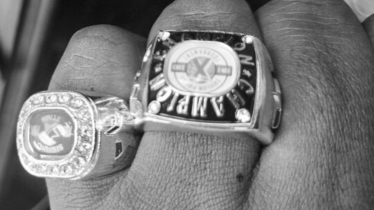 Jason Hennington displays the 2023 Taylor Press 3-on-3 Basketball Tournament rings that will be awarded to the top age groups and Shining Stars.