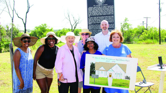 Dickey Museum board members and representatives from the Texas Historical Foundation attend a press conference to announce a $500,000 grant from the St. David’s Foundation that will be used to build a replica of the home of Dr. James Lee Dickey. At the event are (from left) Linda Jackson,...