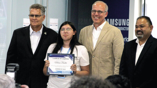 Melanie Badillo (middle), an intern at Samsung Austin Semiconductor, stands with her certificate. She worked in the communications department during her sixweek internship. She was congratulated by (from left) Williamson County Judge Bill Gravell, Mayor Brandt Rydell and Taylor ISD board P...