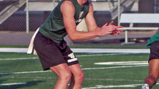 Taylor High School varsity football senior quarterback Joshua Mikulencak prepares to receive the snap on Tuesday, Aug. 1 during the Ducks’ first week of fall practice. Photos by Andrew Salmi