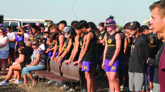 Granger High School’s football team watches as the ceremony unfolds. The new school is expected to be ready for the 2025-26 school year.