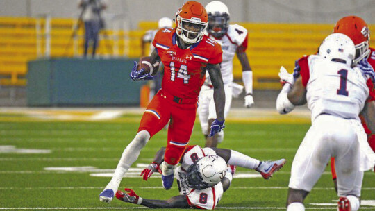 Former Sam Houston State University wide receiver Davion Davis breaks a tackle and gains yards after the catch on Sept. 1, 2017, during a game vs. the University of Richmond at neutral site McLane Stadium in Waco. Photo courtesy of Sam Houston State University