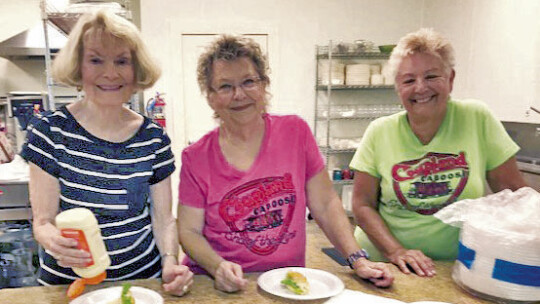 Before Cal Roberts spoke to the Coupland Civic Organization meeting, supper was served by Barbara Piper, Susan Schmidt, and Becky Sutton.