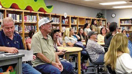 A standing-room-only crowd attended the May 15 the Coupland School board meeting. All speakers praised Superintendent Tammy Brinkman and wanted to retain her. Photos by Susan Garry