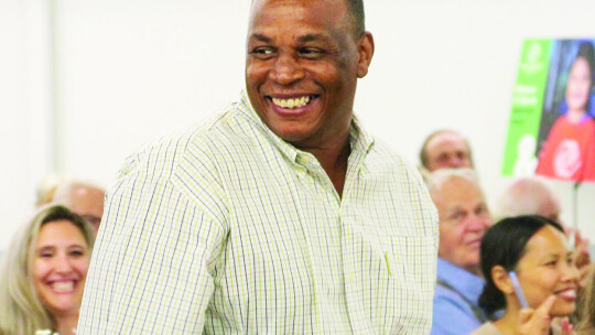 Gerald Anderson walks to the stage to accept his award. Anderson serves as the chair of the club’s board of directors. Photo by Hunter Dworaczyk