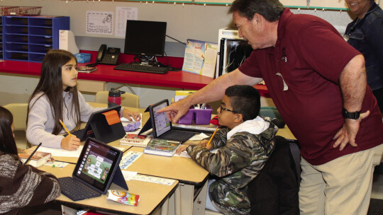 Tim Mikeska, a 2022-2023 Taylor ISD ambassador, learns about math curriculum while visiting a classroom at Pasemann Elementary School.