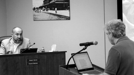 Councilman Robert Garcia observes citizen speaker Michael Prillaman speak against the ordinance. Photo by Hunter Dworaczyk