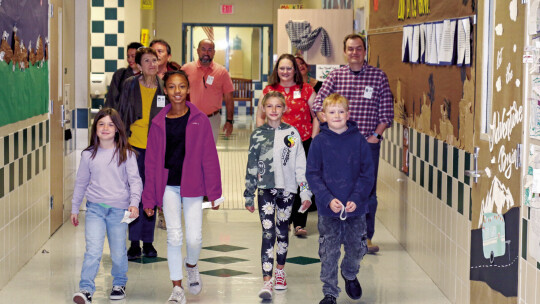 Student leaders at Pasemann Elementary give a guided tour of their campus to last year’s Ambassadors. Courtesy photo